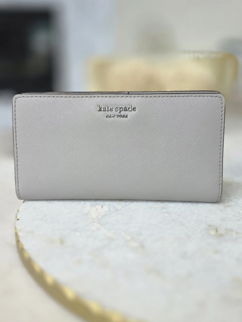 Kate Spade New York Gray Saffiano Large Slim Bifold Wallet Silver Logo